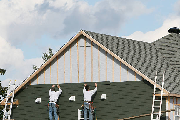 Professional Siding Contractor technician working in Darien, GA